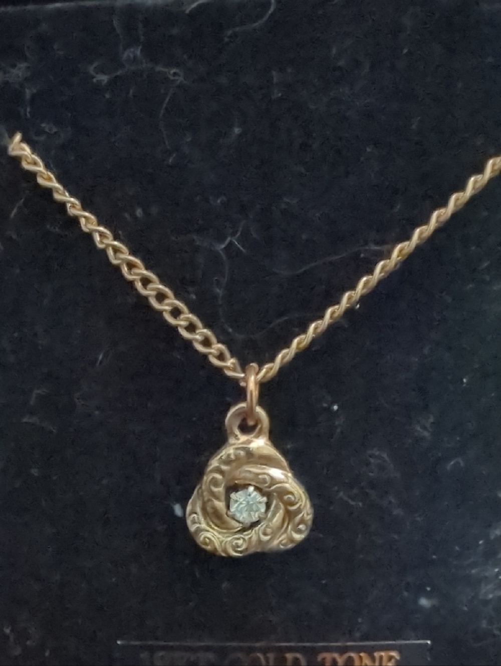Gold-Tone Celtic Love Knot Pendant Necklace with Clear Stone